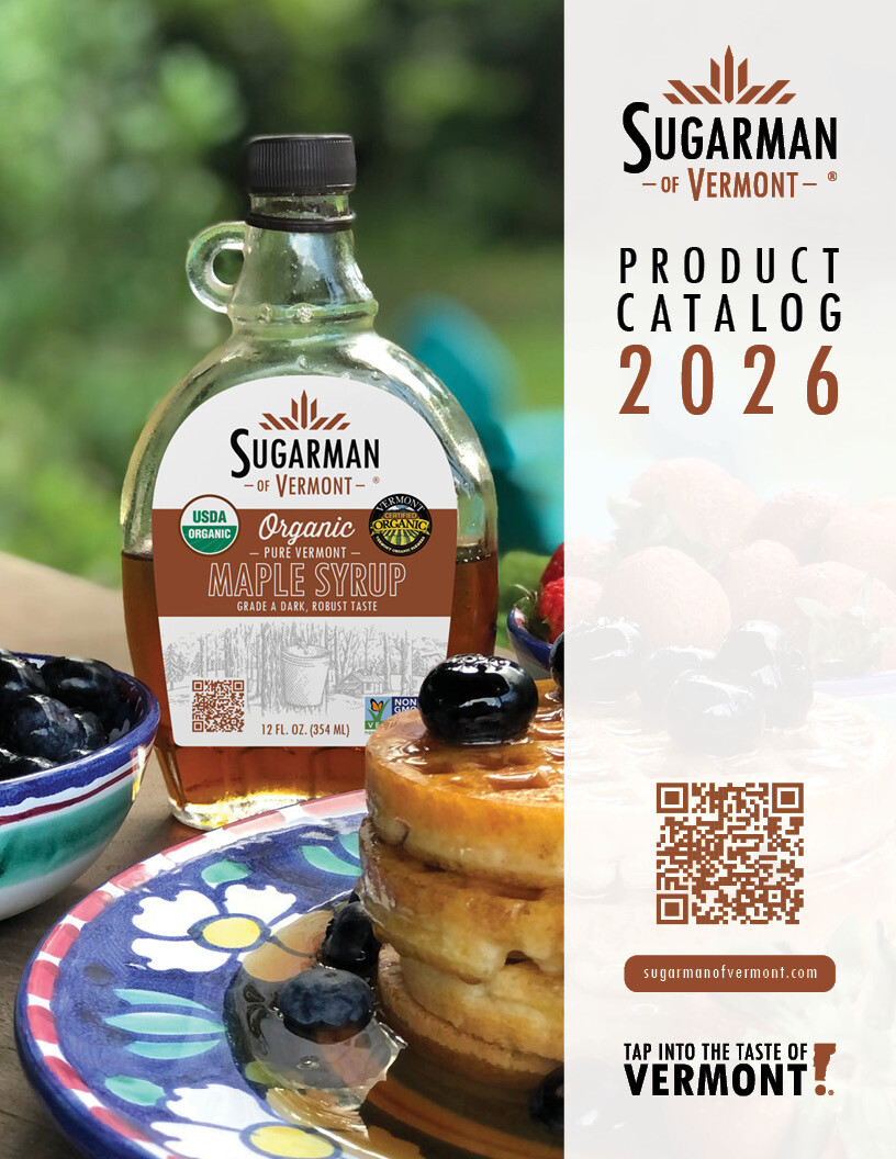 Bottle of Sugarman's organic maple syrup beside pancakes topped with blueberries.
