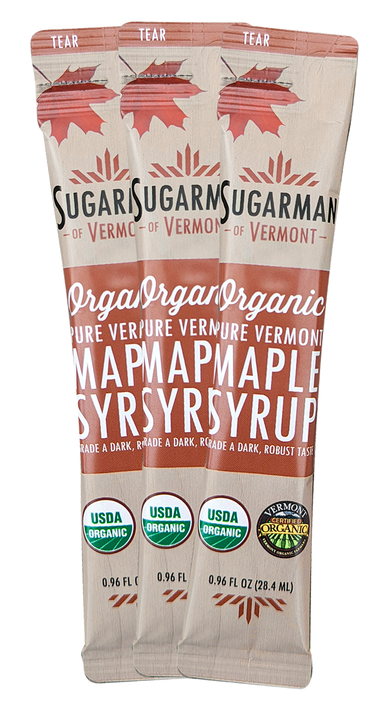 Three pouches of organic Vermont maple syrup with "tear" marks for easy opening.